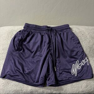 Size Small, deep purple color Youngla soft mesh shorts.